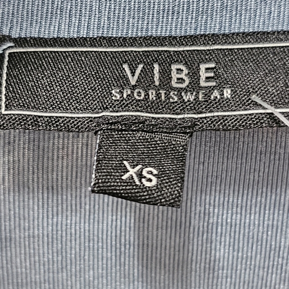 Blue long sleeve knit stretch button collared top - Picture 8 of 9